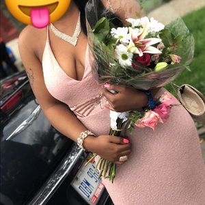 A soft baby pink prom dress